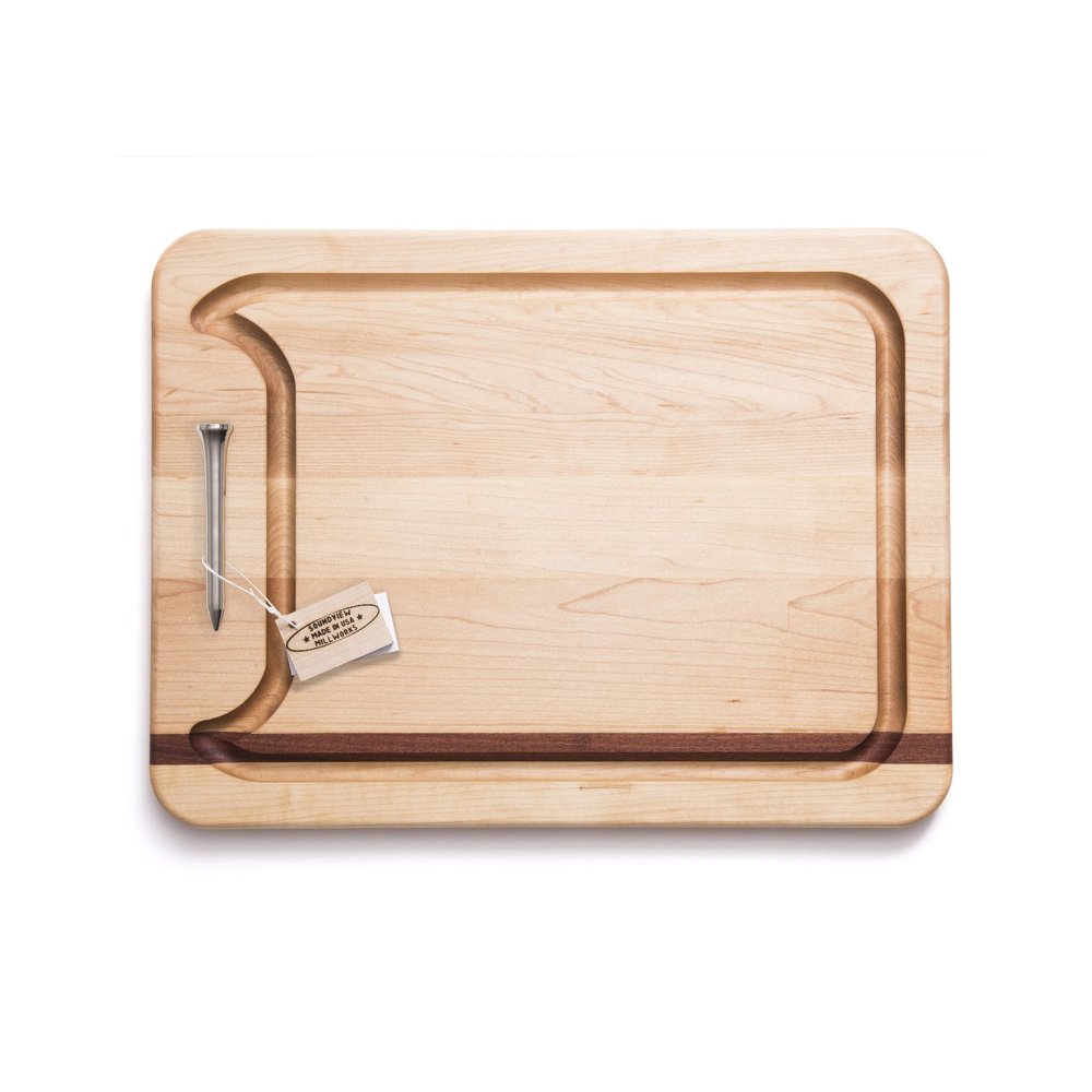 A medium-sized rectangular wooden appetizer board with a single chrome-plated brass handle, a groove for juice collection, and a branded tag attached.