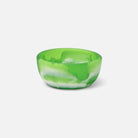 Green and white marbled bowl on a light gray background