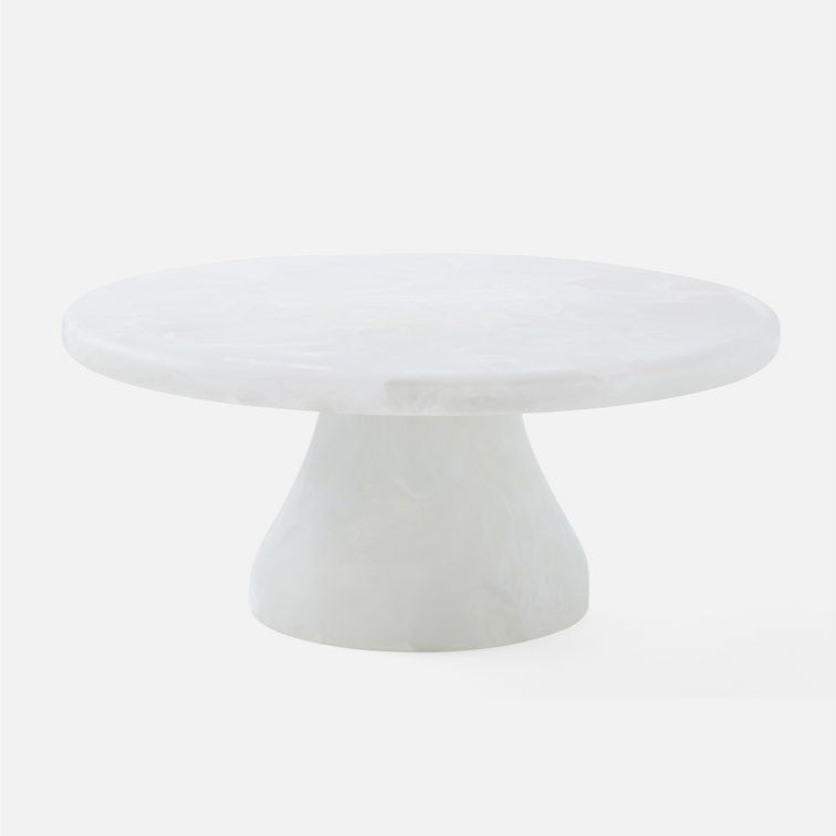 White pedestal table on a white background
